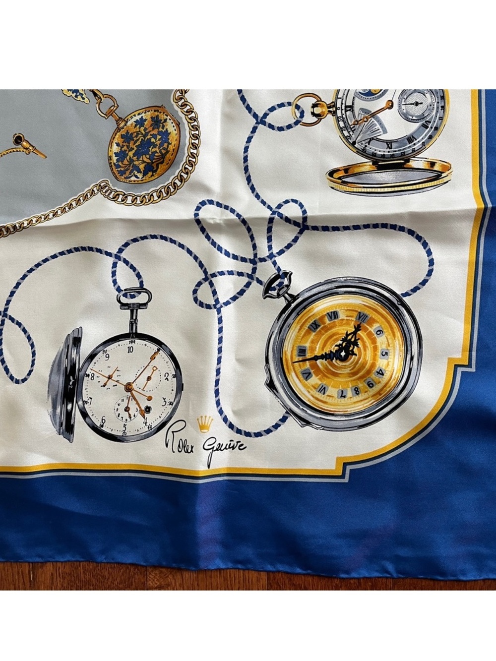Vintage Rolex Geneva Silk Scarf
100% Silk Blue White Excellent Condition!
